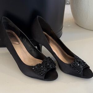 Women’s black embellished bow heels